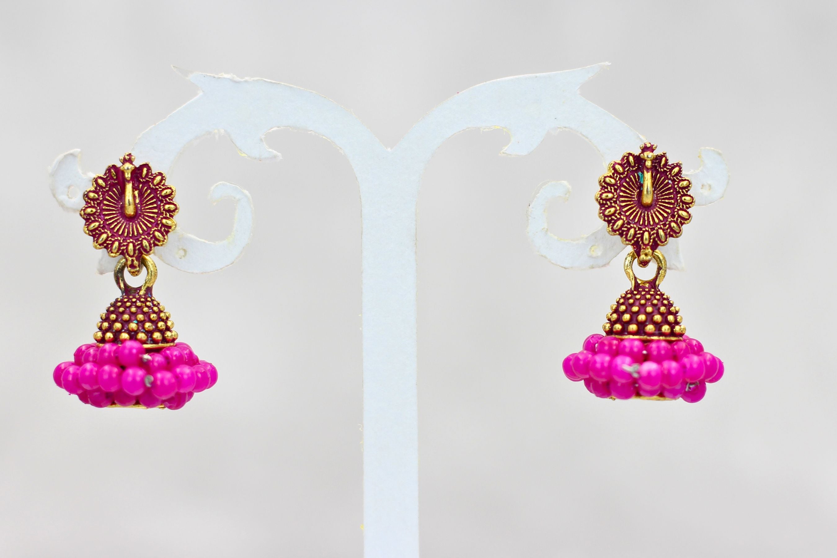 Regal Gold-Plated Oxidized Jhumka Earrings with Pearls - Ethnic Glamour Jewelry JCS Fashions Pink 1 inch