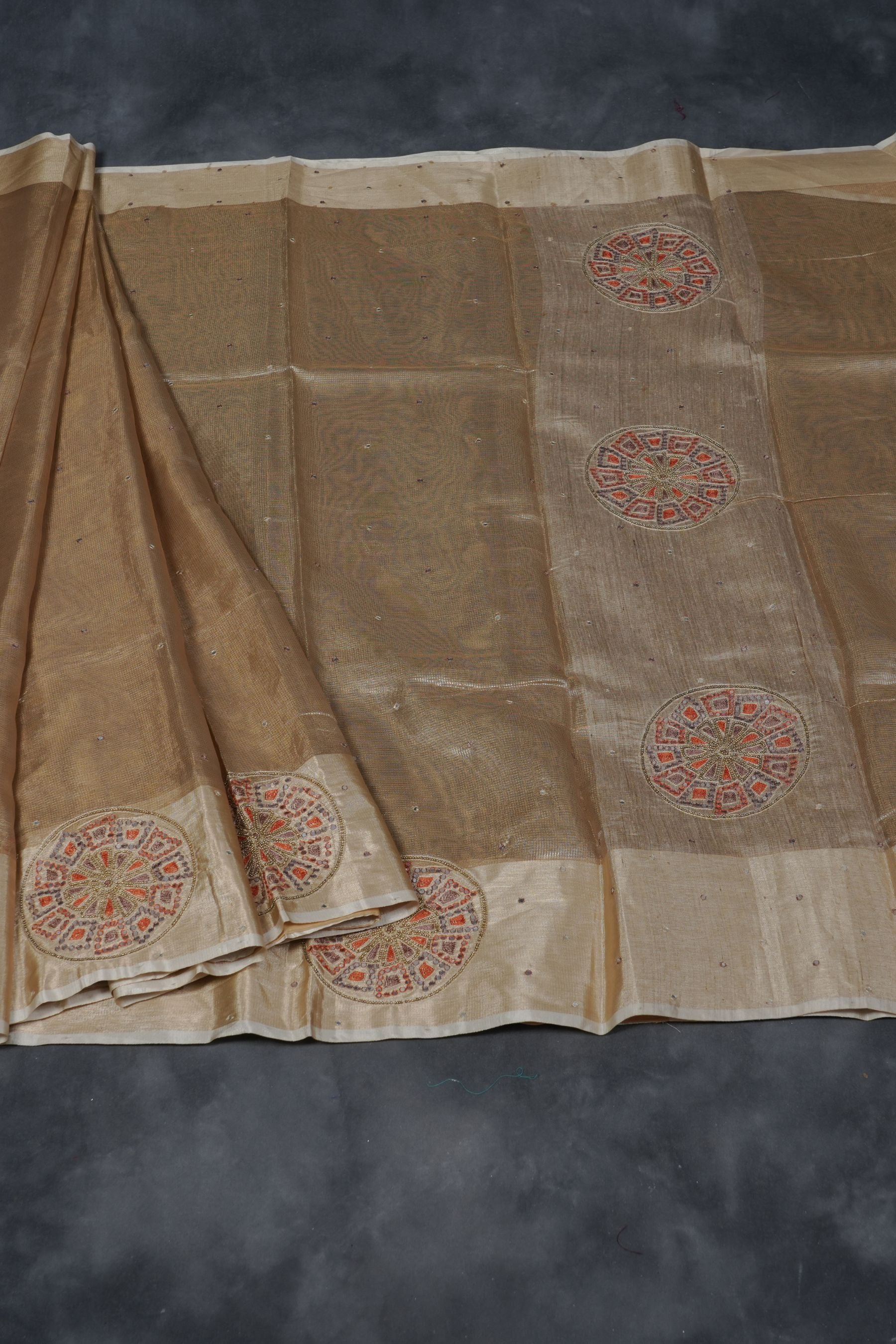 Gold Tissue Silk Sarees with Hand Embroidery and Maggam Work Blouse