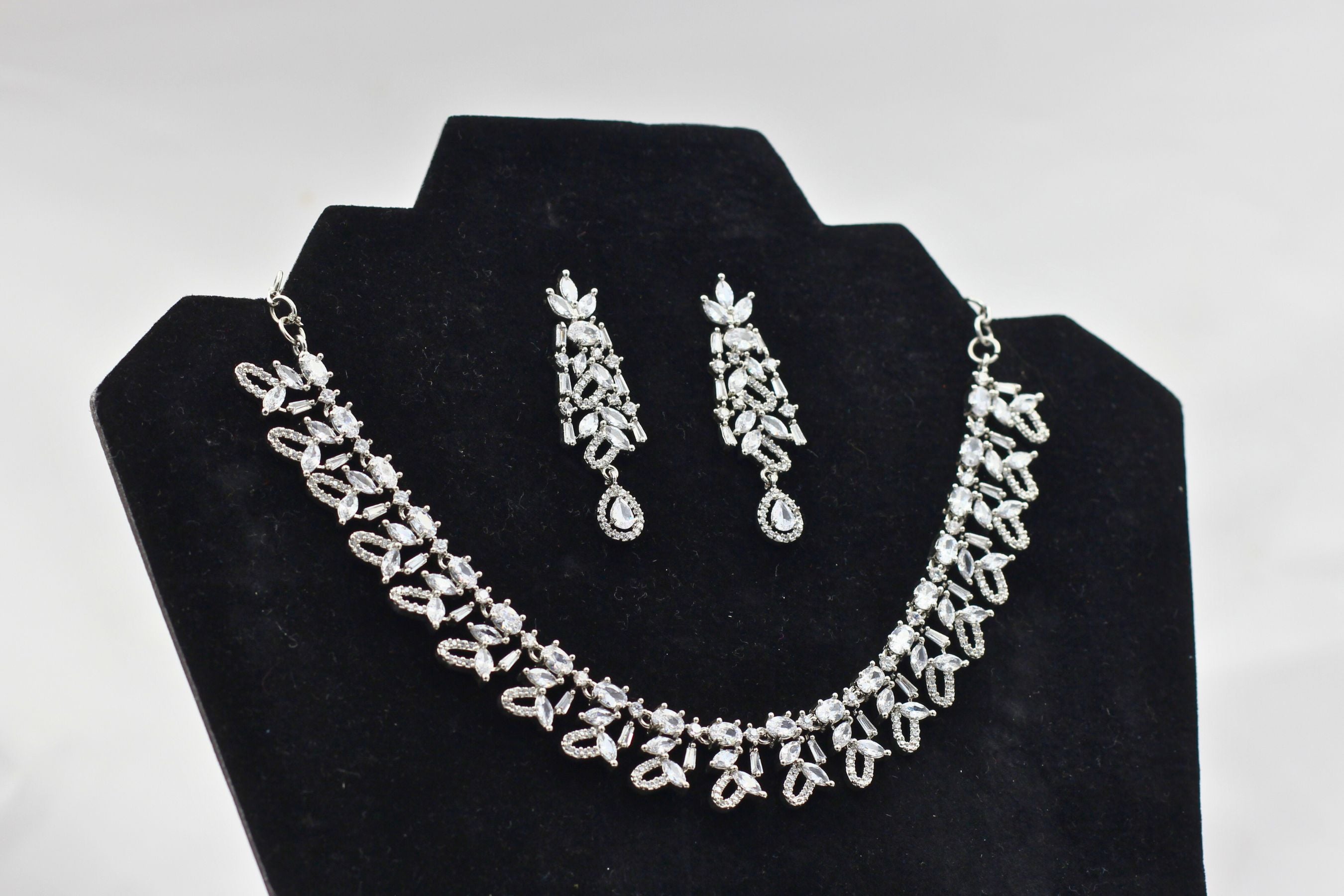 Sparkling Silver Polish Stone Necklace & Earring Set from JCSFashions