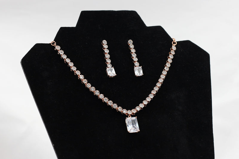 Handcrafted Rose Gold Jewelry Set with Intricate Stone Carvings