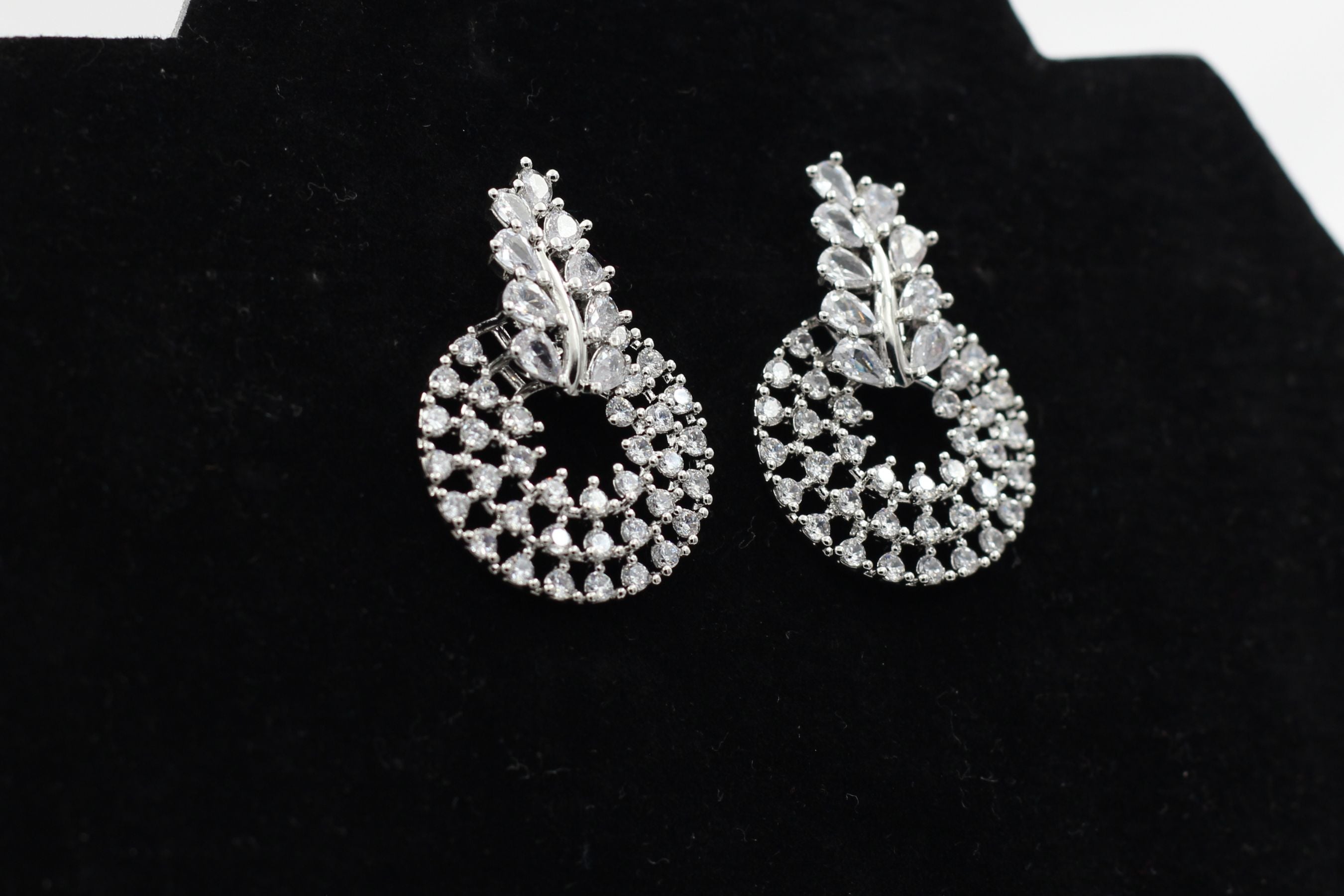 Elegant Silver Polish Designer Earrings with Gleaming White Stones Jewelry JCS Fashions