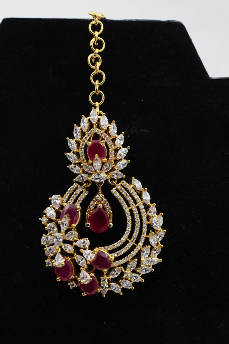 Regal Gold-Polished American Diamond Tikka with Pink & White Stones