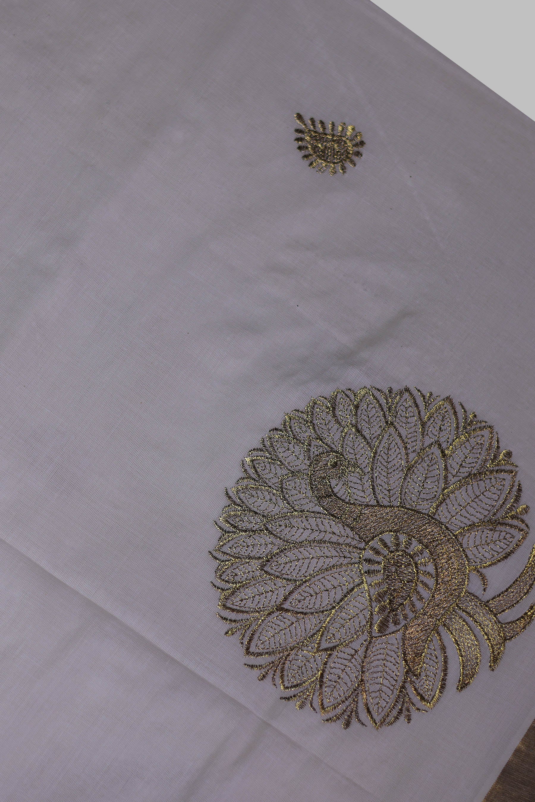 Elegant Kerala Cotton Saree with Peacock Motifs & Gold Zari Border Saree JCS Fashions