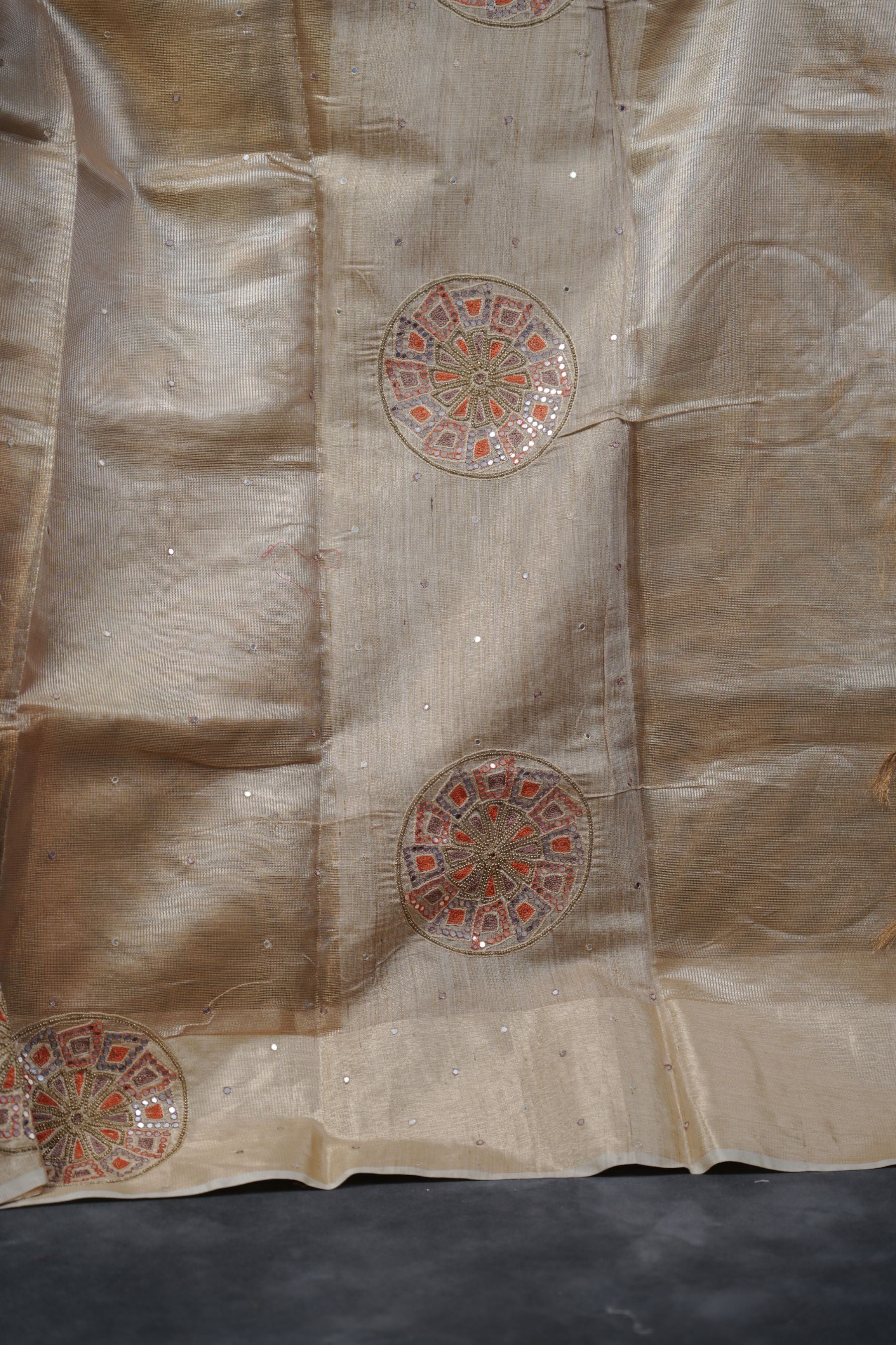 Gold Tissue Silk Sarees with Hand Embroidery and Maggam Work Blouse