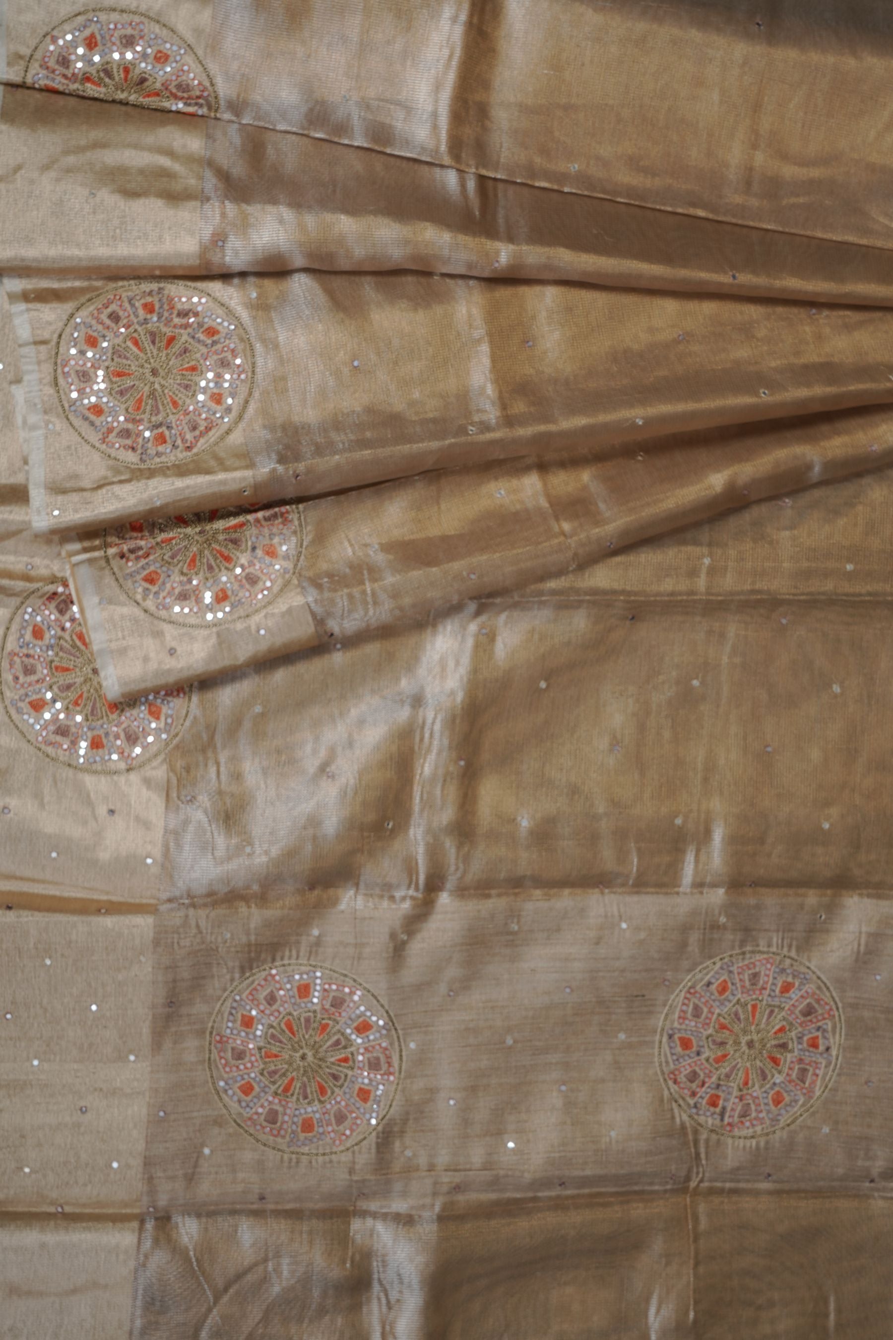 Gold Tissue Silk Sarees with Hand Embroidery and Maggam Work Blouse