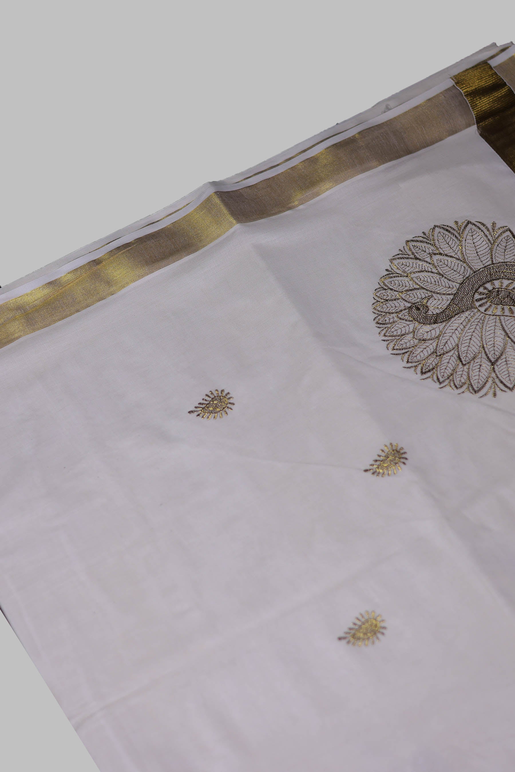 Elegant Kerala Cotton Saree with Peacock Motifs & Gold Zari Border Saree JCS Fashions