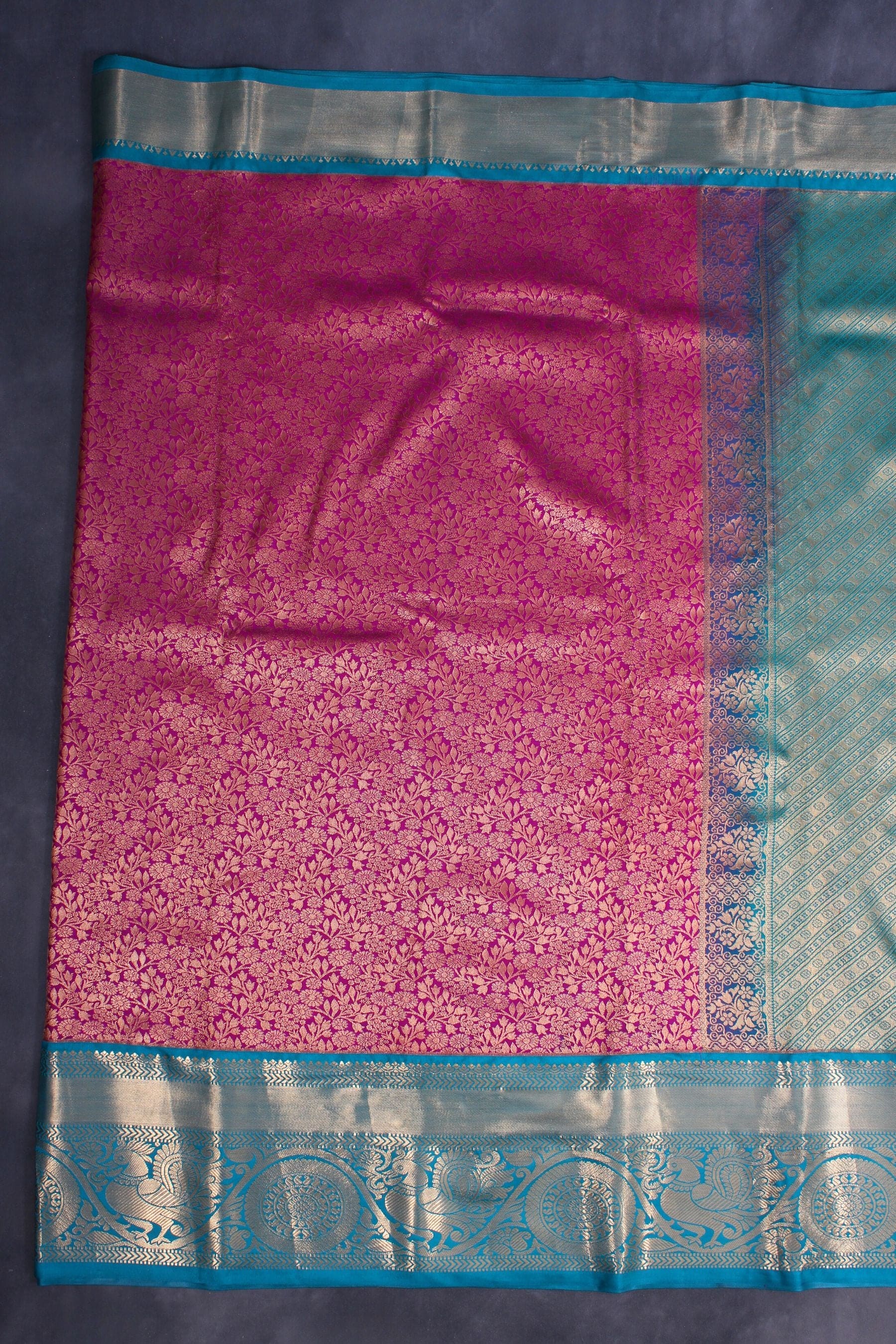 Elegant Kanchipuram Silk Saree with Floral Motifs and Dual Border