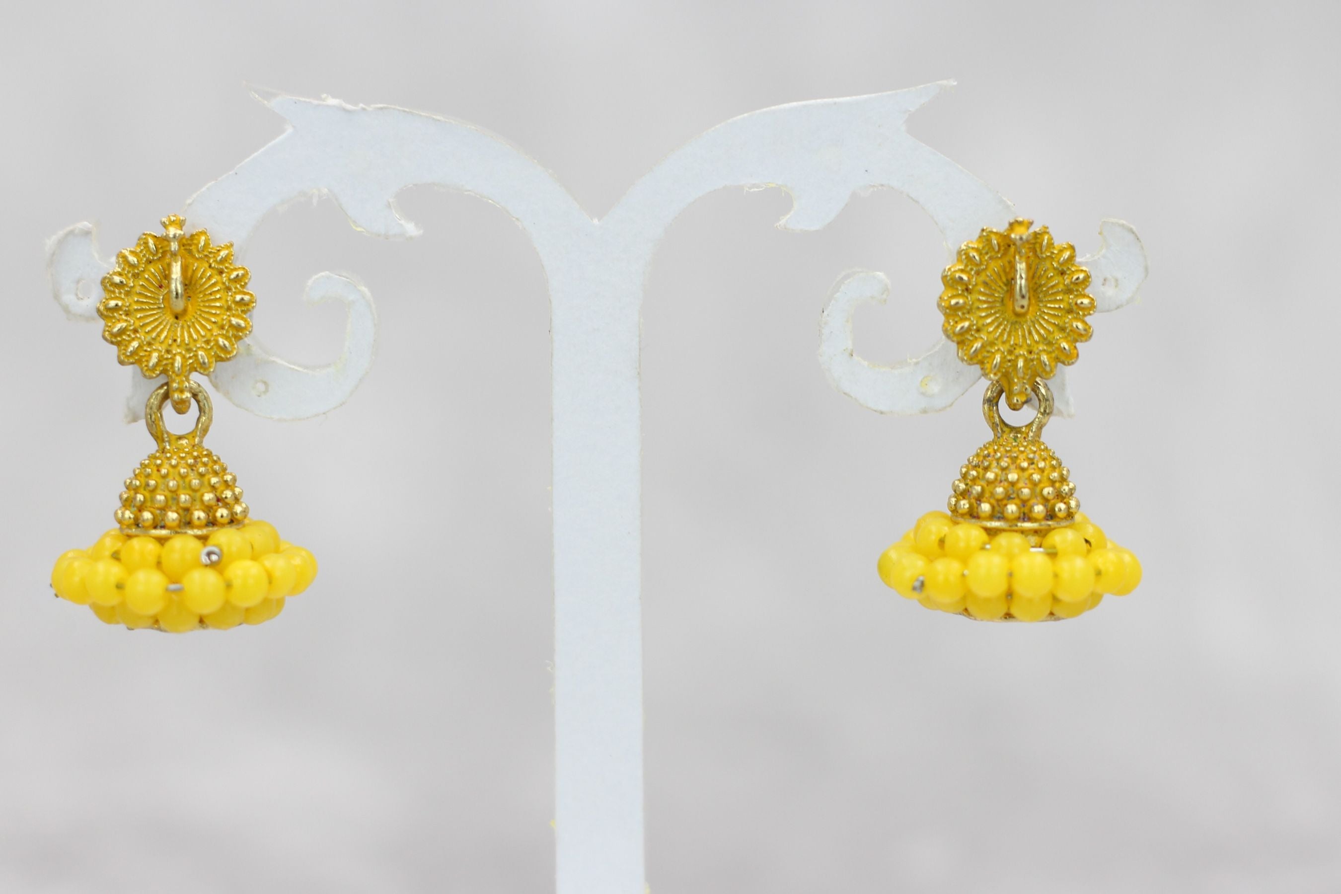 Regal Gold-Plated Oxidized Jhumka Earrings with Pearls - Ethnic Glamour Jewelry JCS Fashions Yellow 1 inch