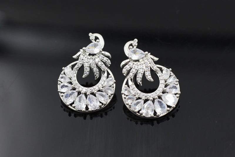 Exquisite Silver Polish Designer Earrings with Radiant White Stone