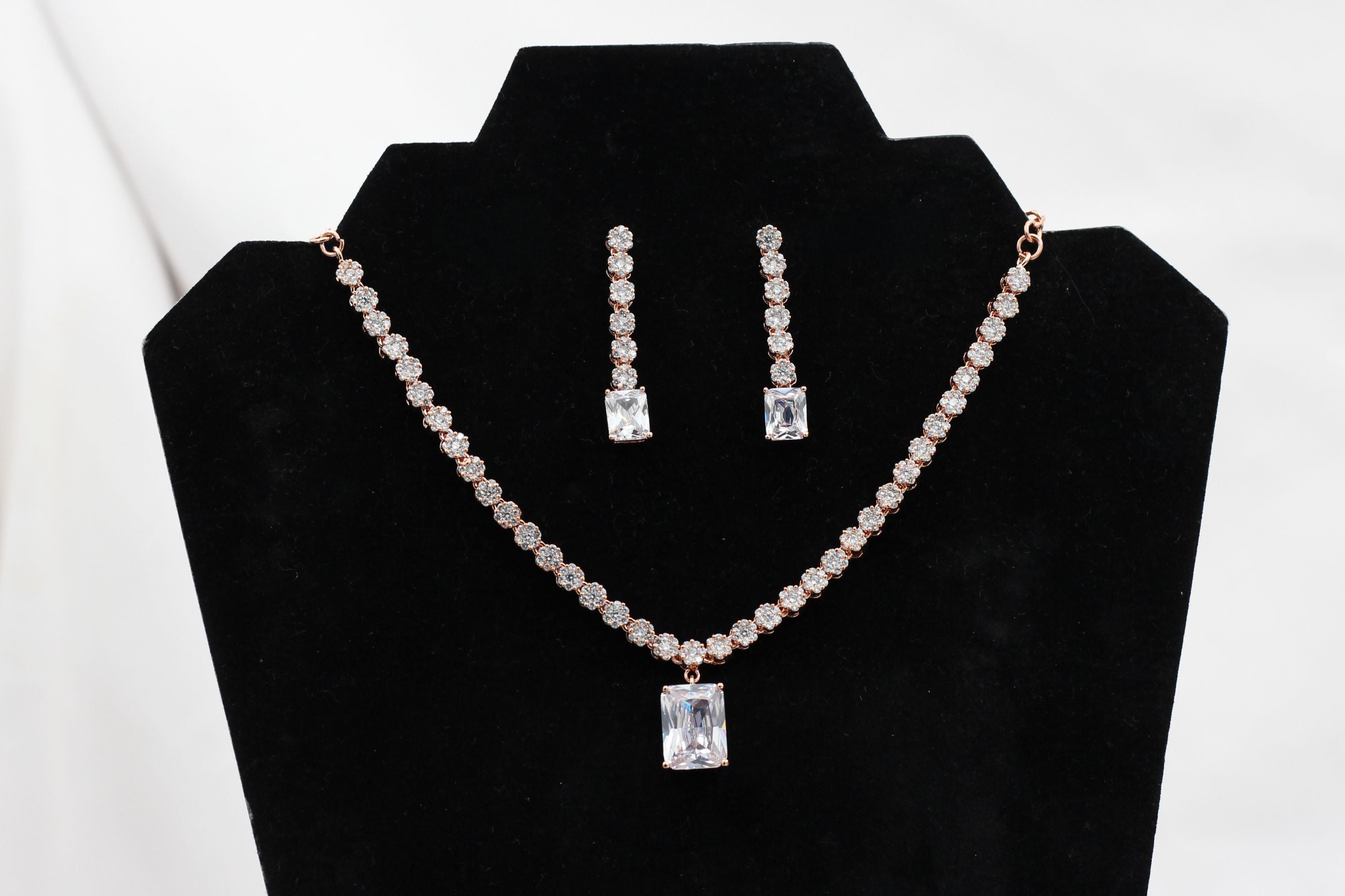 Handcrafted Rose Gold Jewelry Set with Intricate Stone Carvings