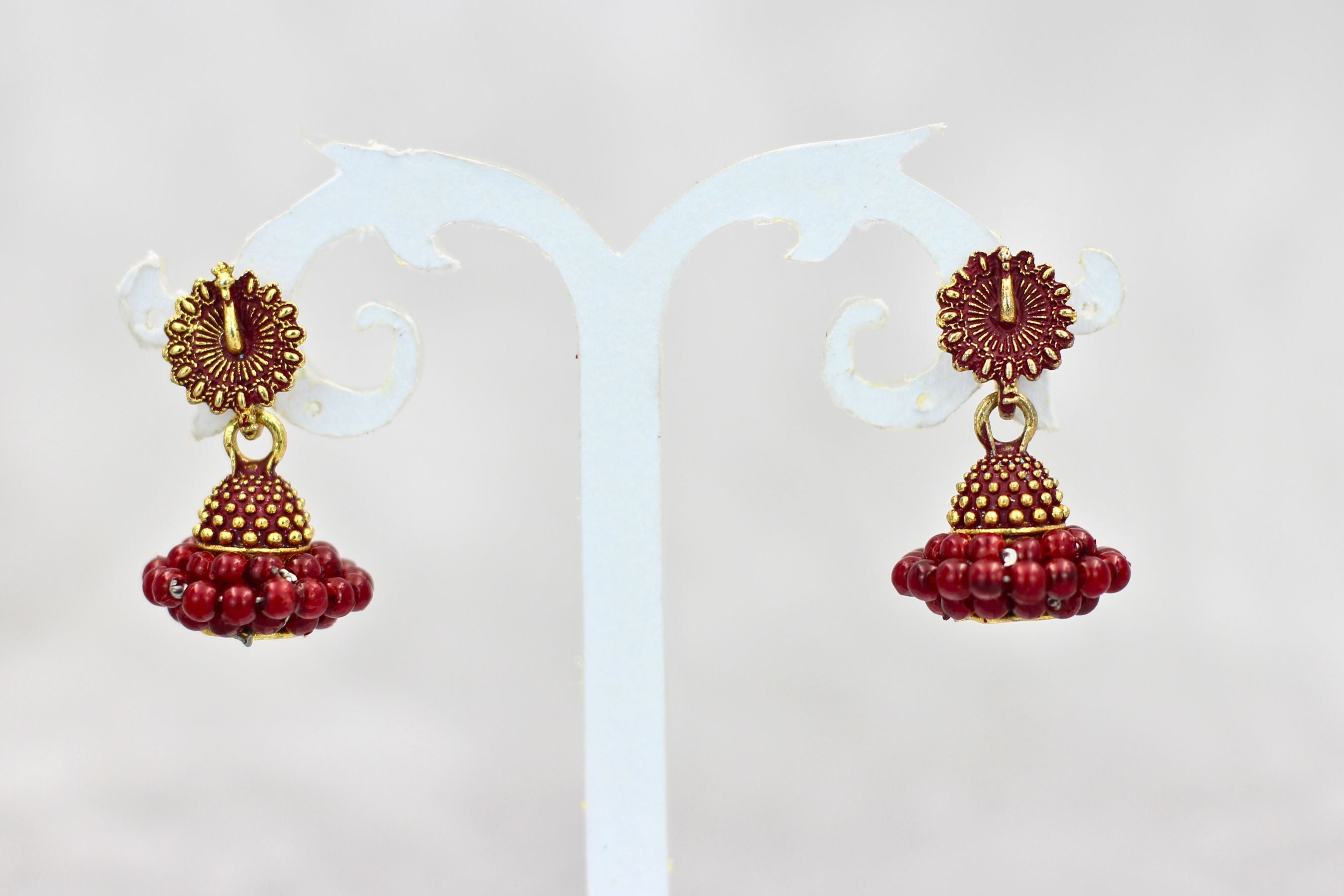 Regal Gold-Plated Oxidized Jhumka Earrings with Pearls - Ethnic Glamour Jewelry JCS Fashions Maroon 1 inch