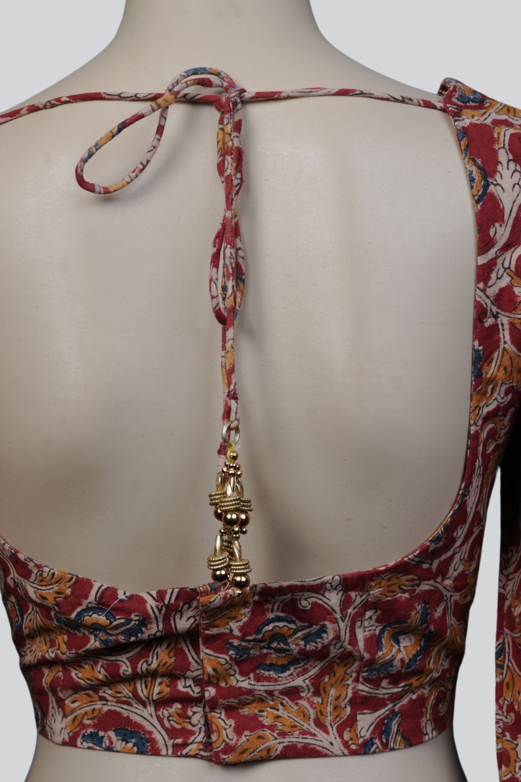 Kalamkari Delight: JCS Fashions Exclusive Back Open Blouse with Tassels Blouse JCS Fashions