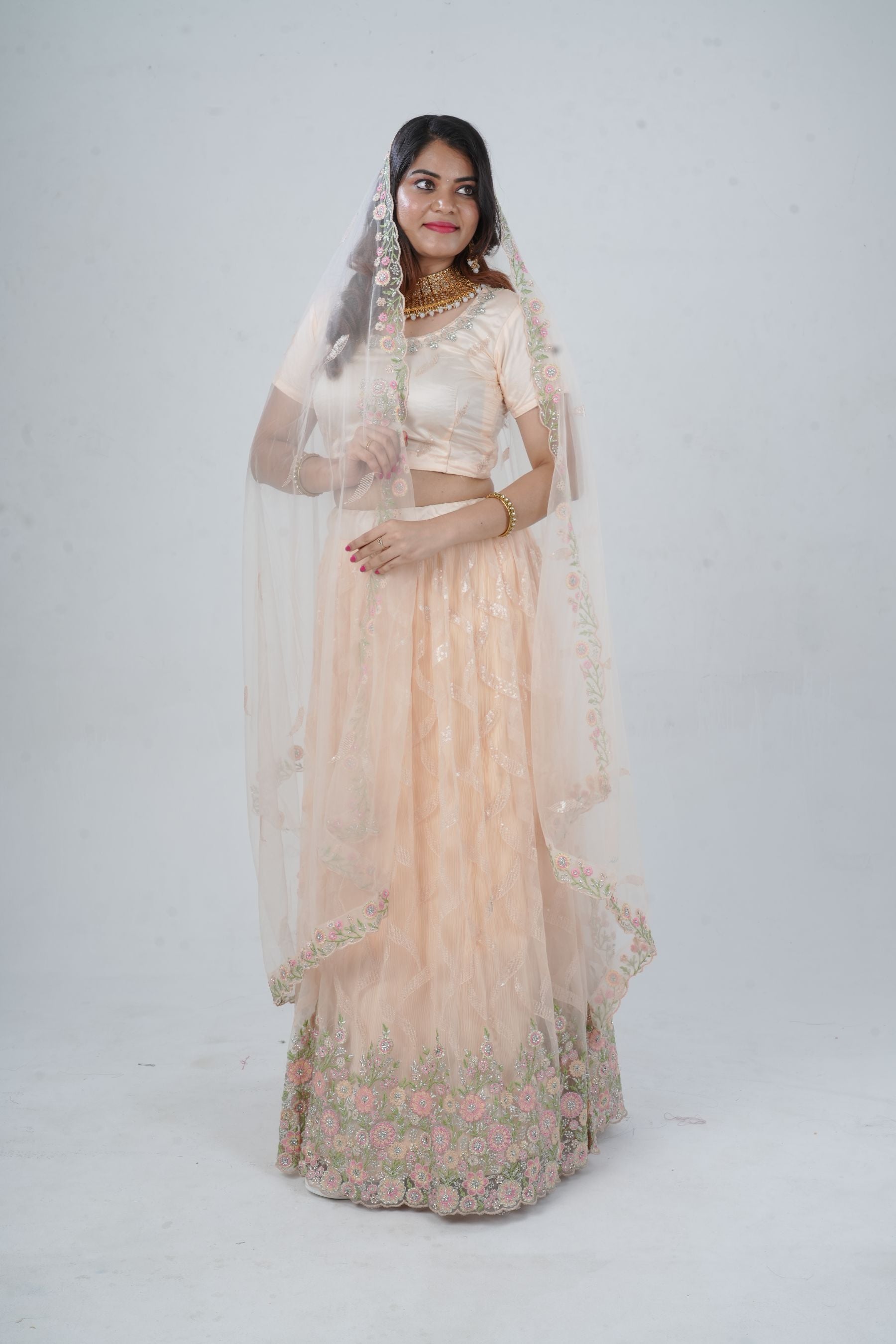 Exquisite Showstopper Lehenga with Lavish Embellishments in Pastel Peach