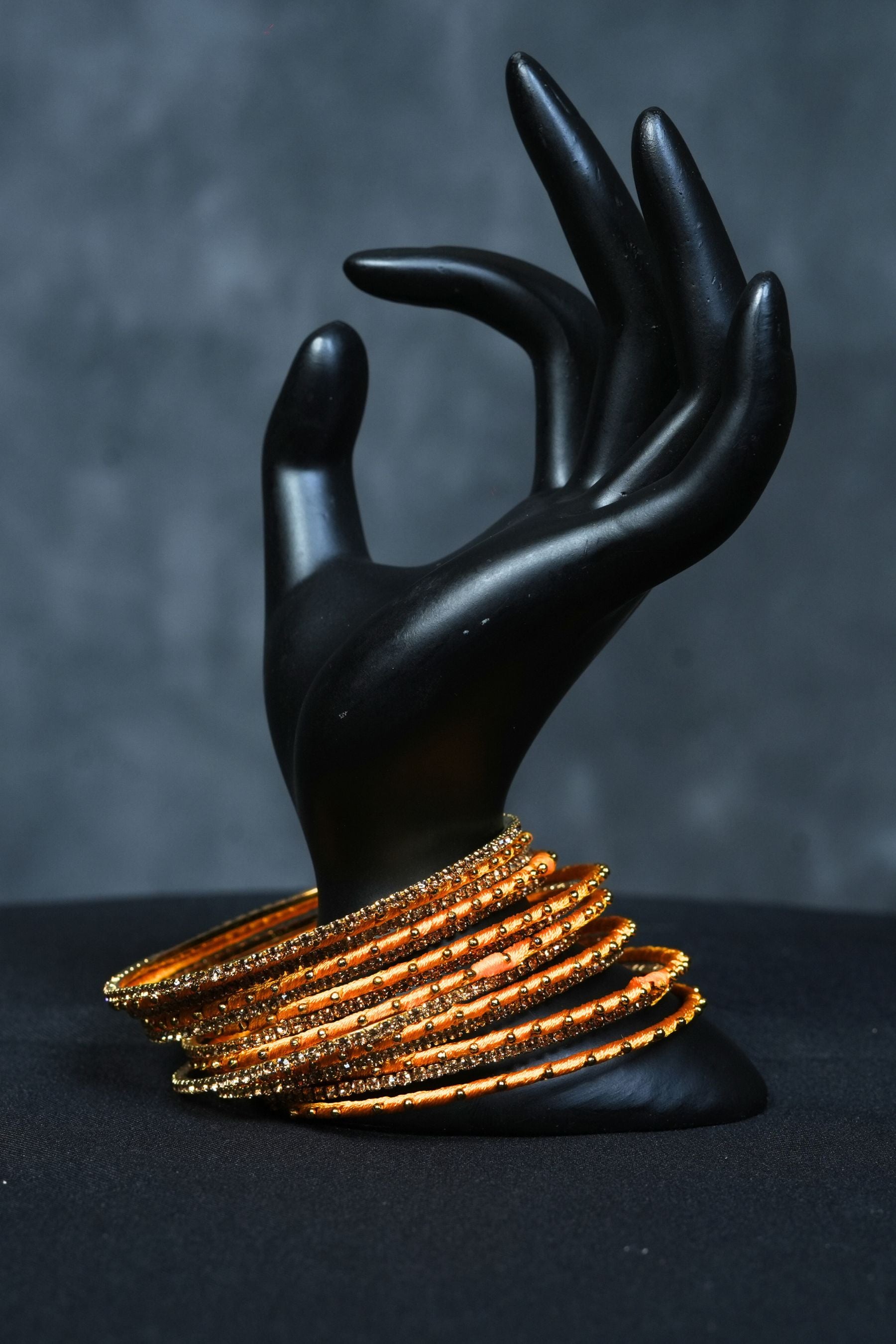 Fancy metal bangles with Golden Bead Elegance at JCSFashions