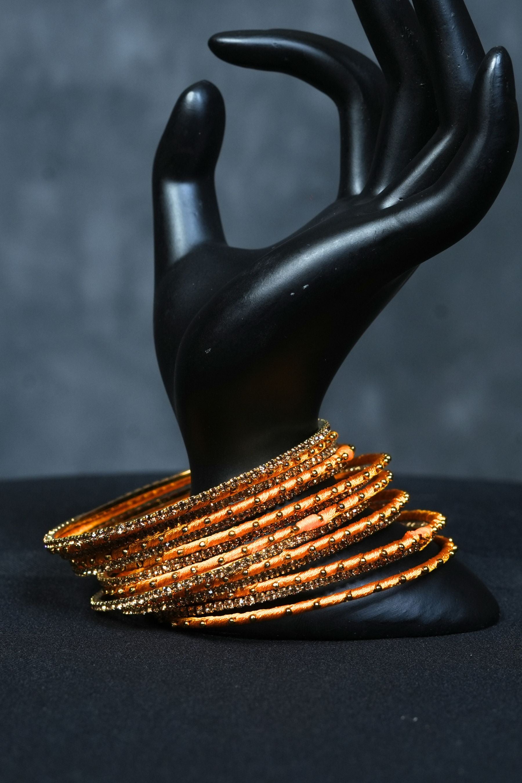 Fancy metal bangles with Golden Bead Elegance at JCSFashions