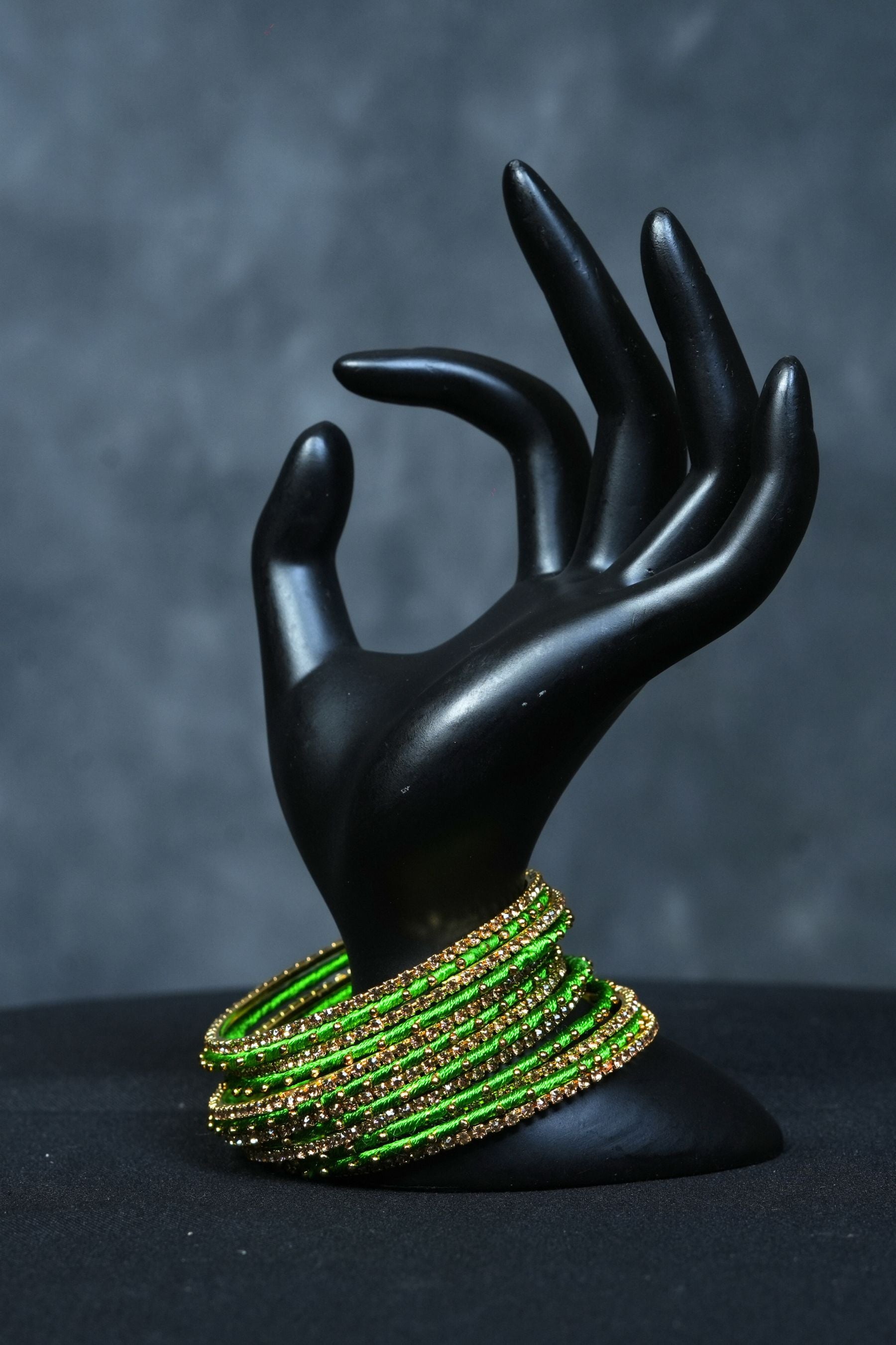 Luxury Radiance: 23 Fancy metal bangles with Golden Bead Elegance