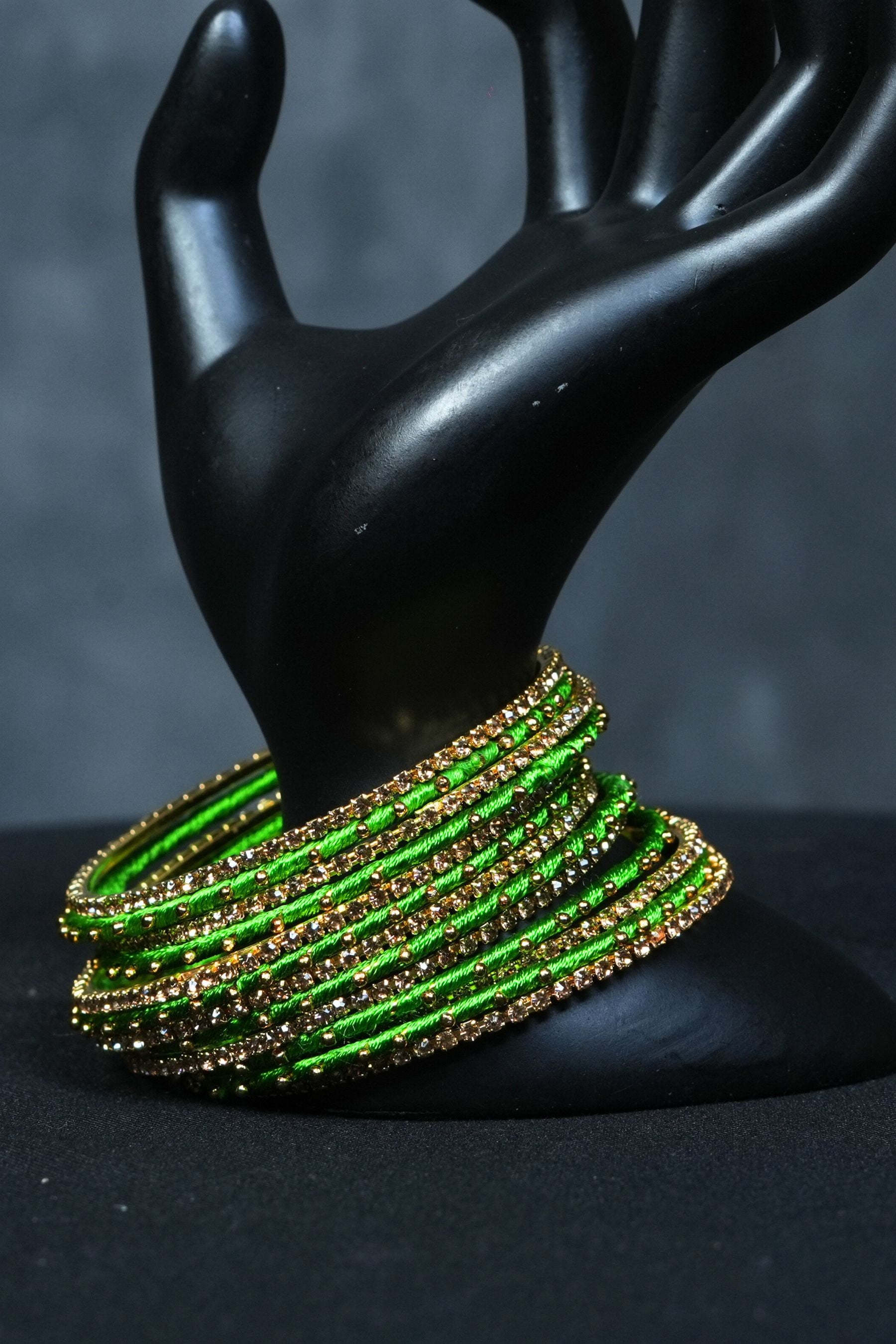 Luxury Radiance: 23 Fancy metal bangles with Golden Bead Elegance