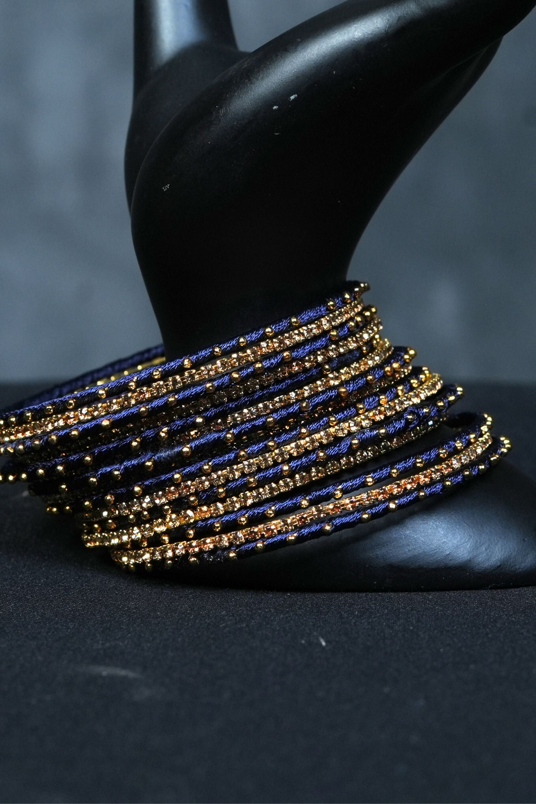 Luxurious Fancy metal bangles: Exquisite Golden Bead Work - Set of 23