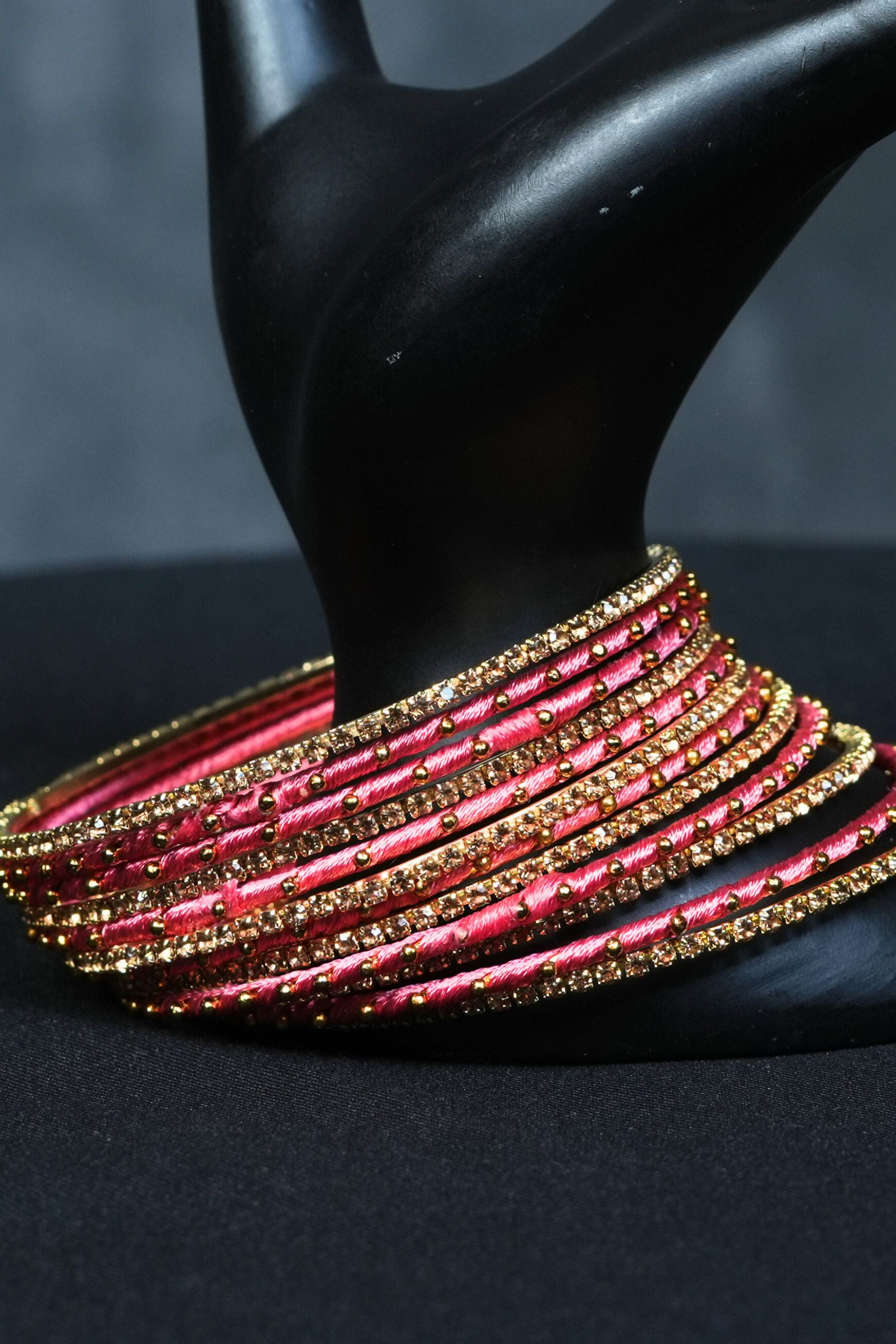 Handcrafted 23-Piece Fancy metal bangles Set with Golden Beads