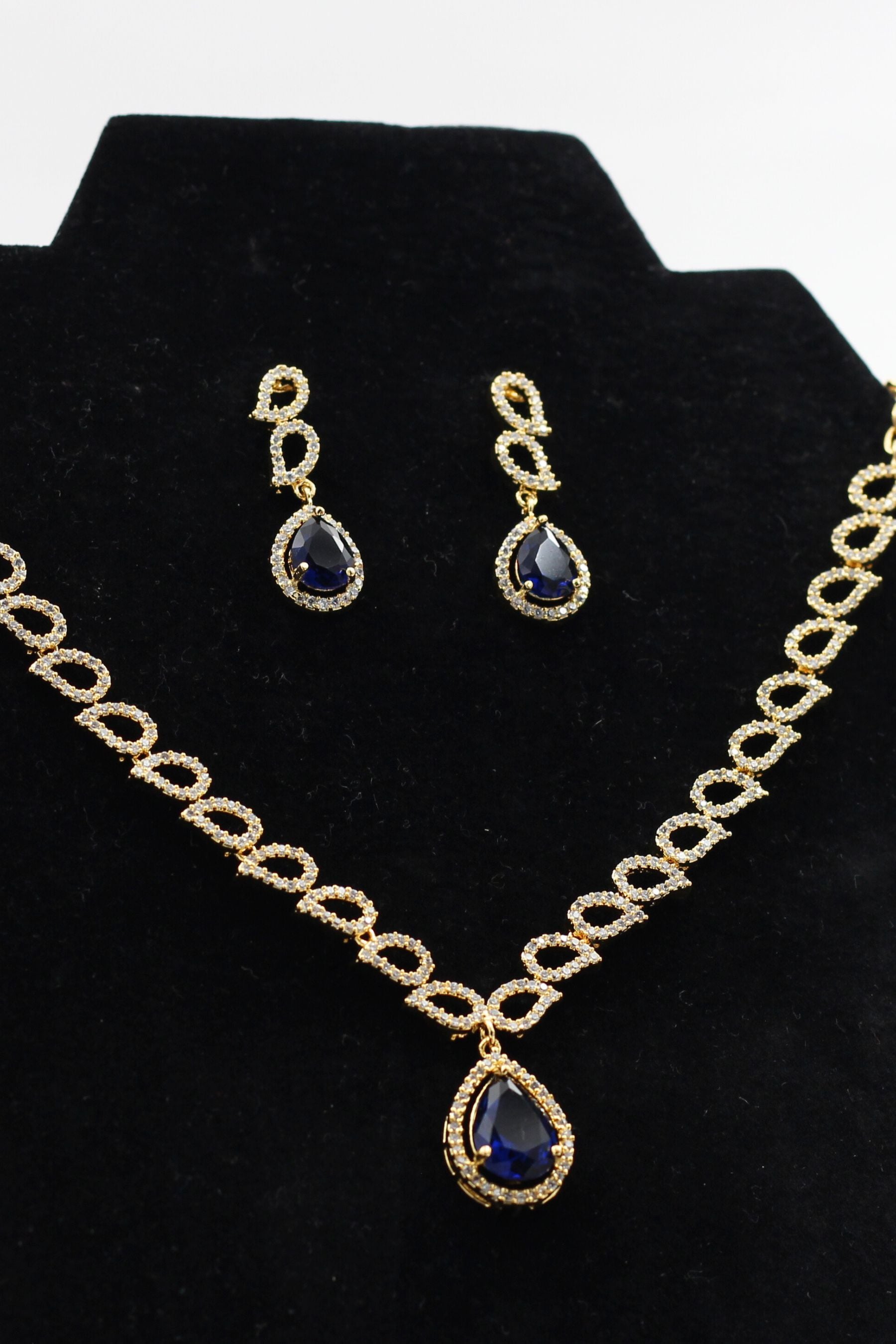 Exquisite Gold Polished Jewelry Set with Vibrant Stones - JCS Fashions