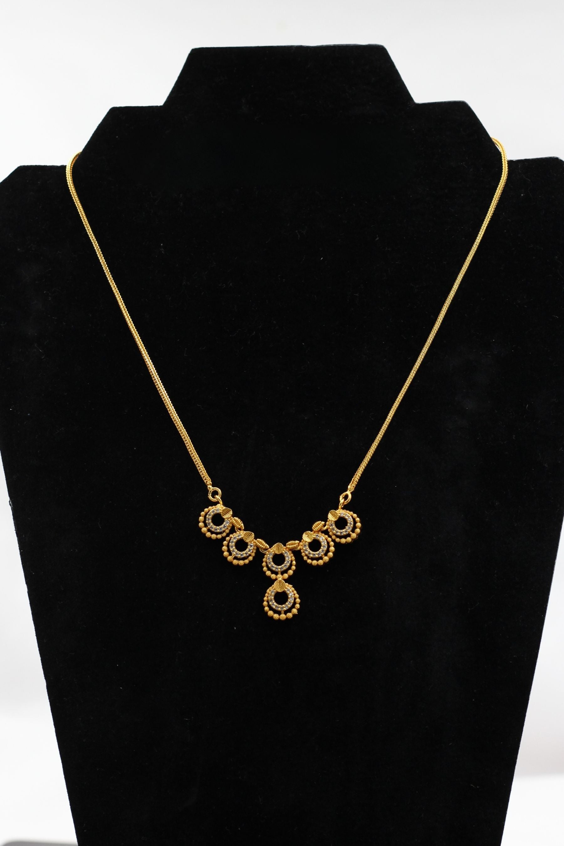 Regal Glamour: JCS Fashion Gold-Tone Chain with White Stone Pendant Jewelry JCS Fashions Gold 8"