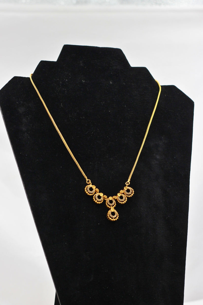 Regal Glamour: JCS Fashion Gold-Tone Chain with White Stone Pendant