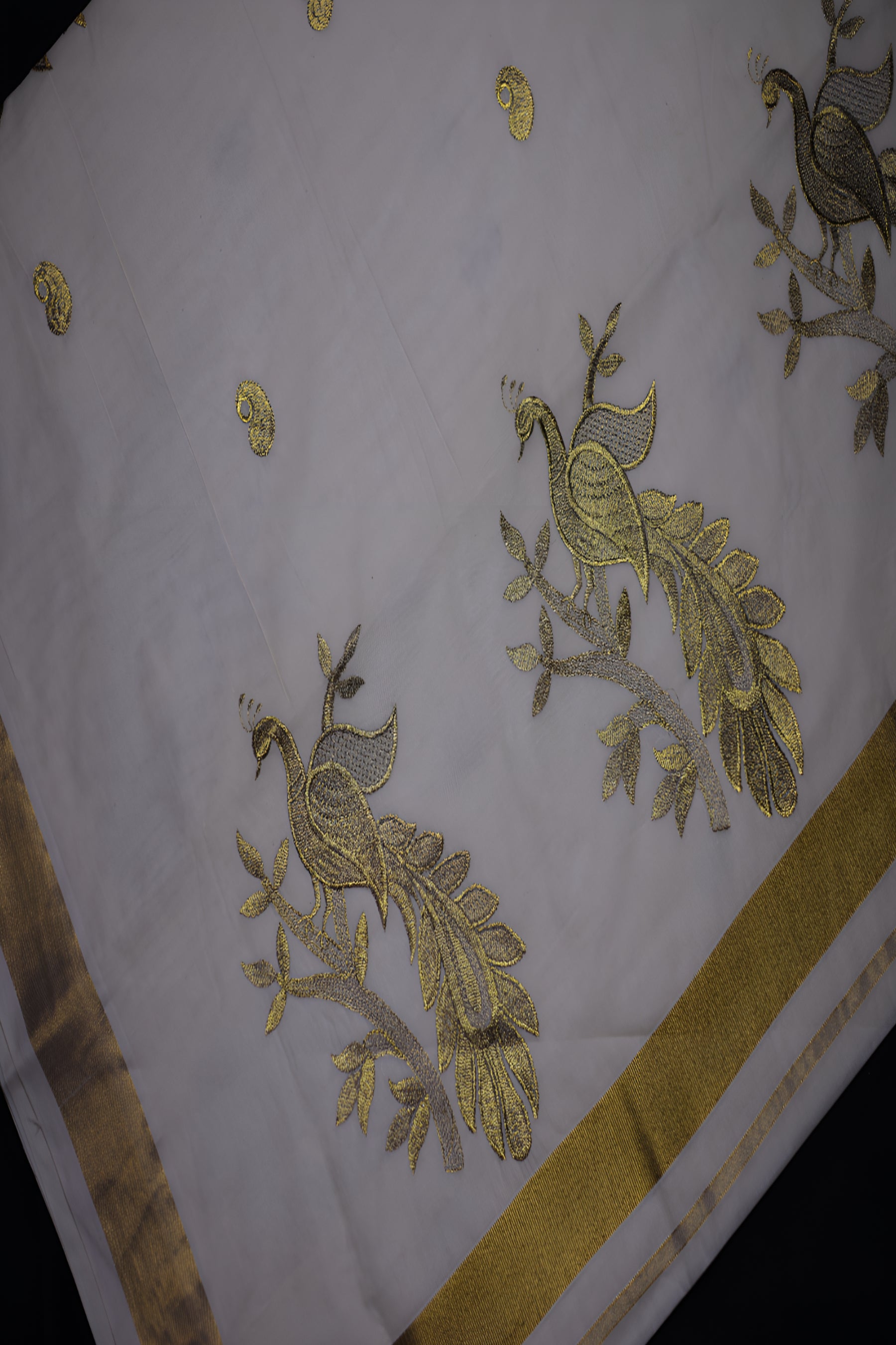 Elegant Kerala Kasavu Cotton Saree with Peacock Motifs and Gold Zari Border Saree JCS Fashions