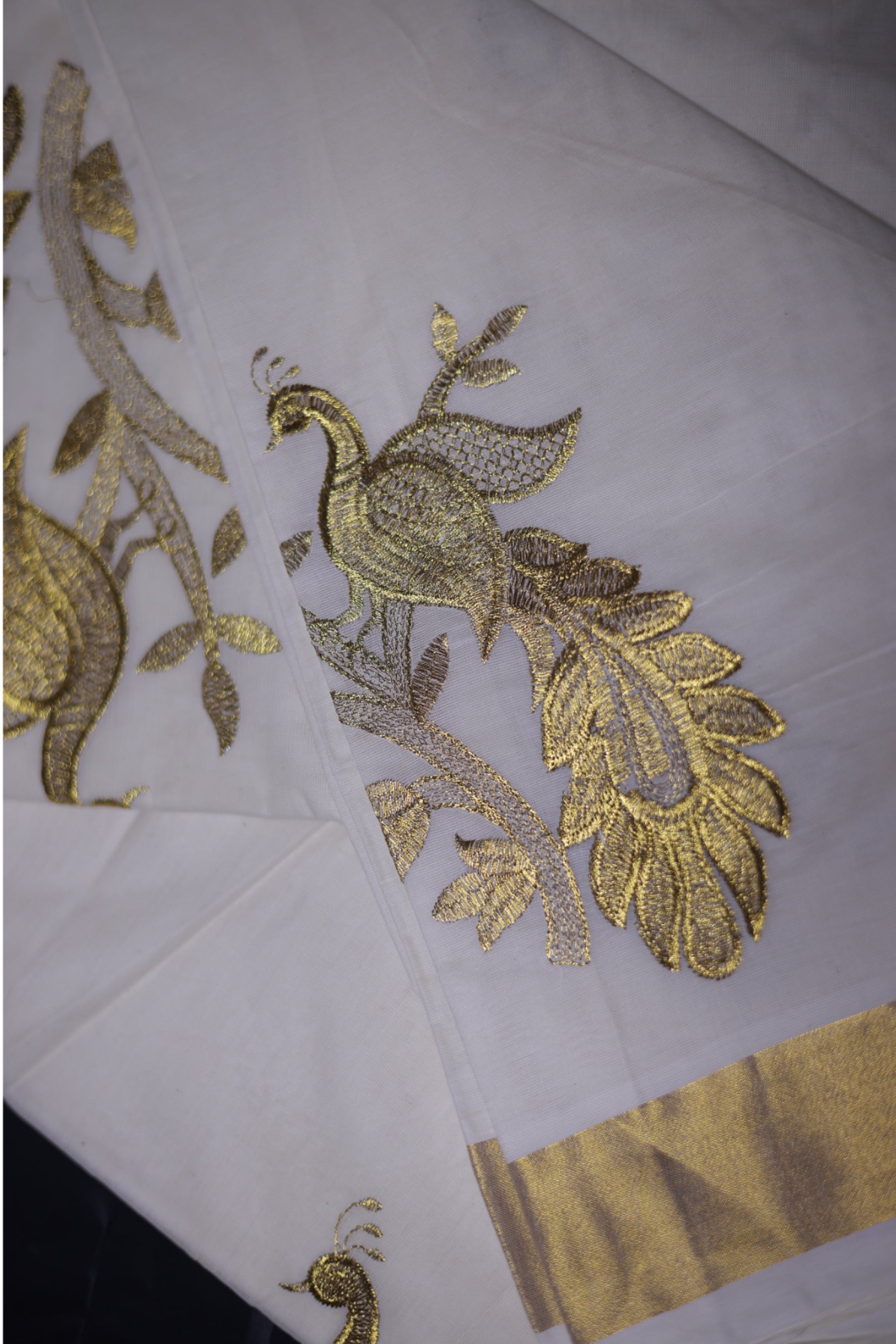 Elegant Kerala Kasavu Cotton Saree with Peacock Motifs and Gold Zari Border Saree JCS Fashions