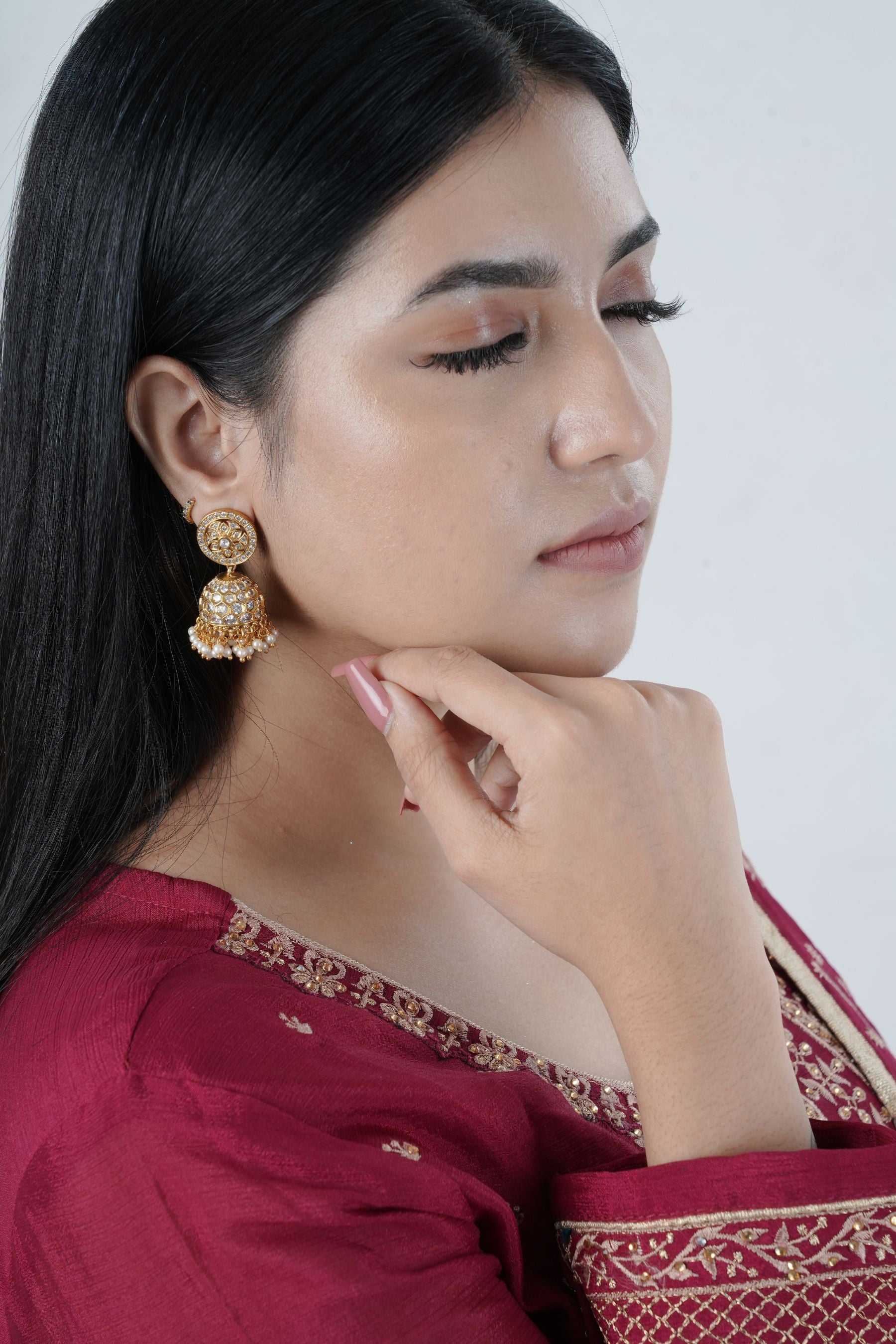 JCS Fashions' Gleaming Gold Jhumka Earrings with White Stones & Pearls Jewelry JCS Fashions