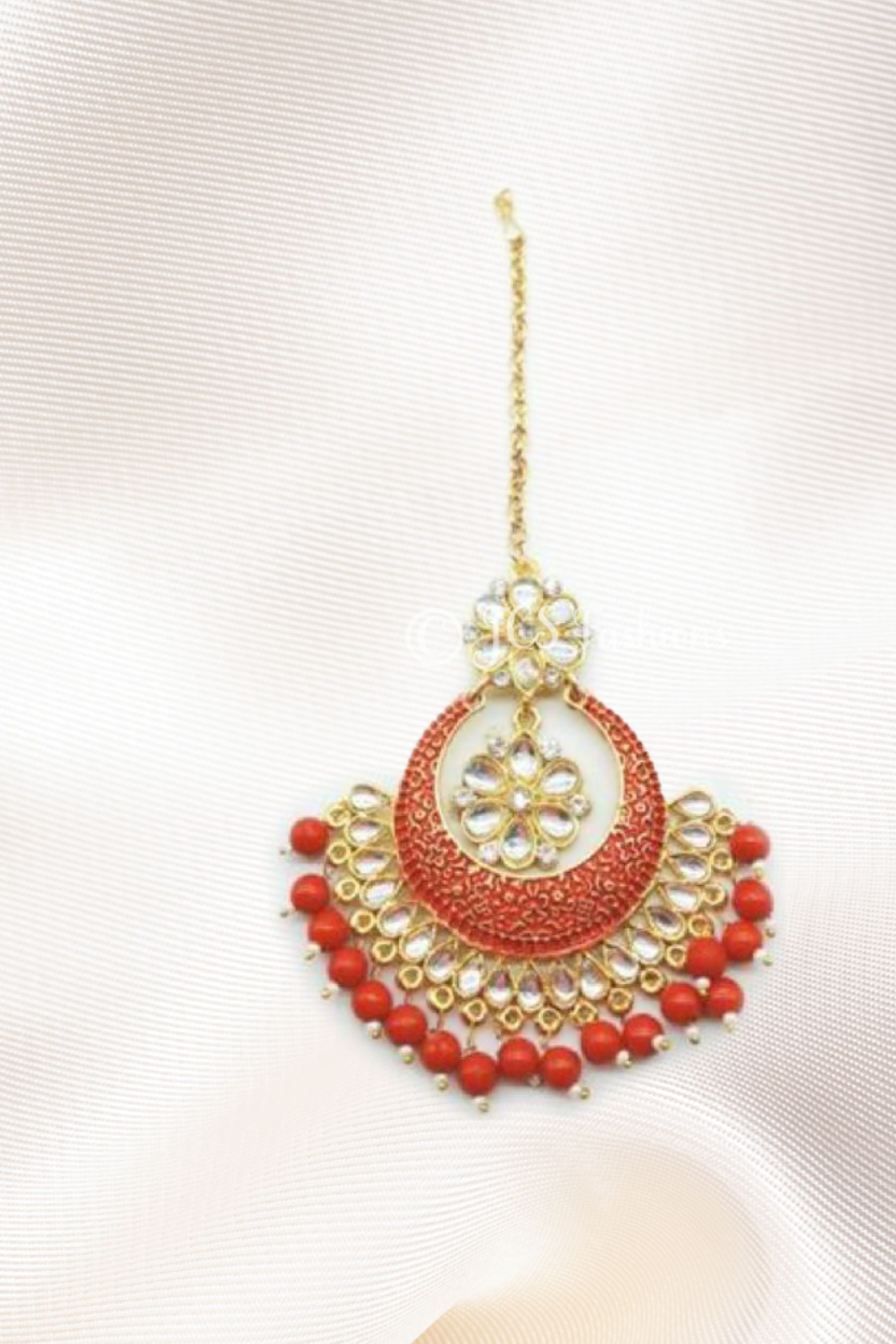 Add a Touch of Glamour to Any Outfit with our Handcrafted Chaand Tika Tikka JCS Fashions Orange